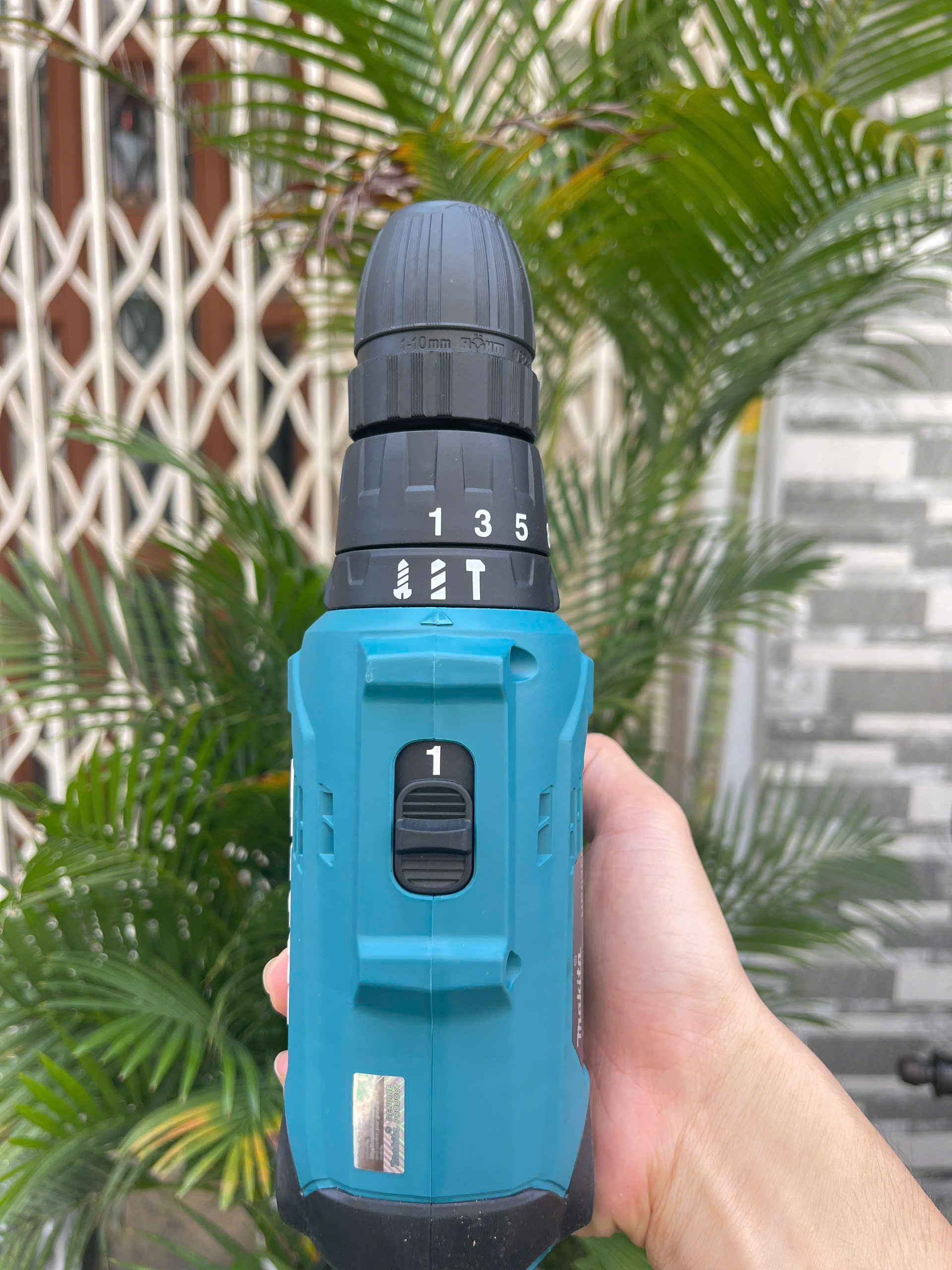 Máy khoan và vặn vít Makita HP0300