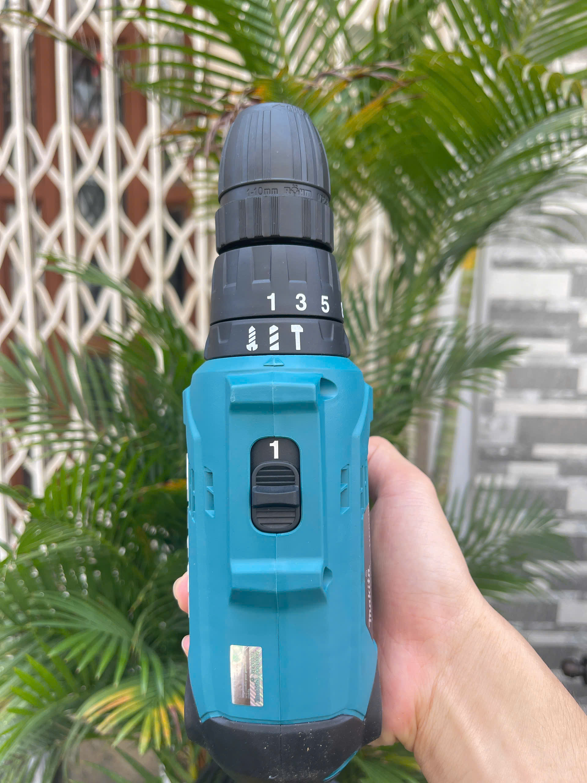 Máy khoan và vặn vít Makita HP0300