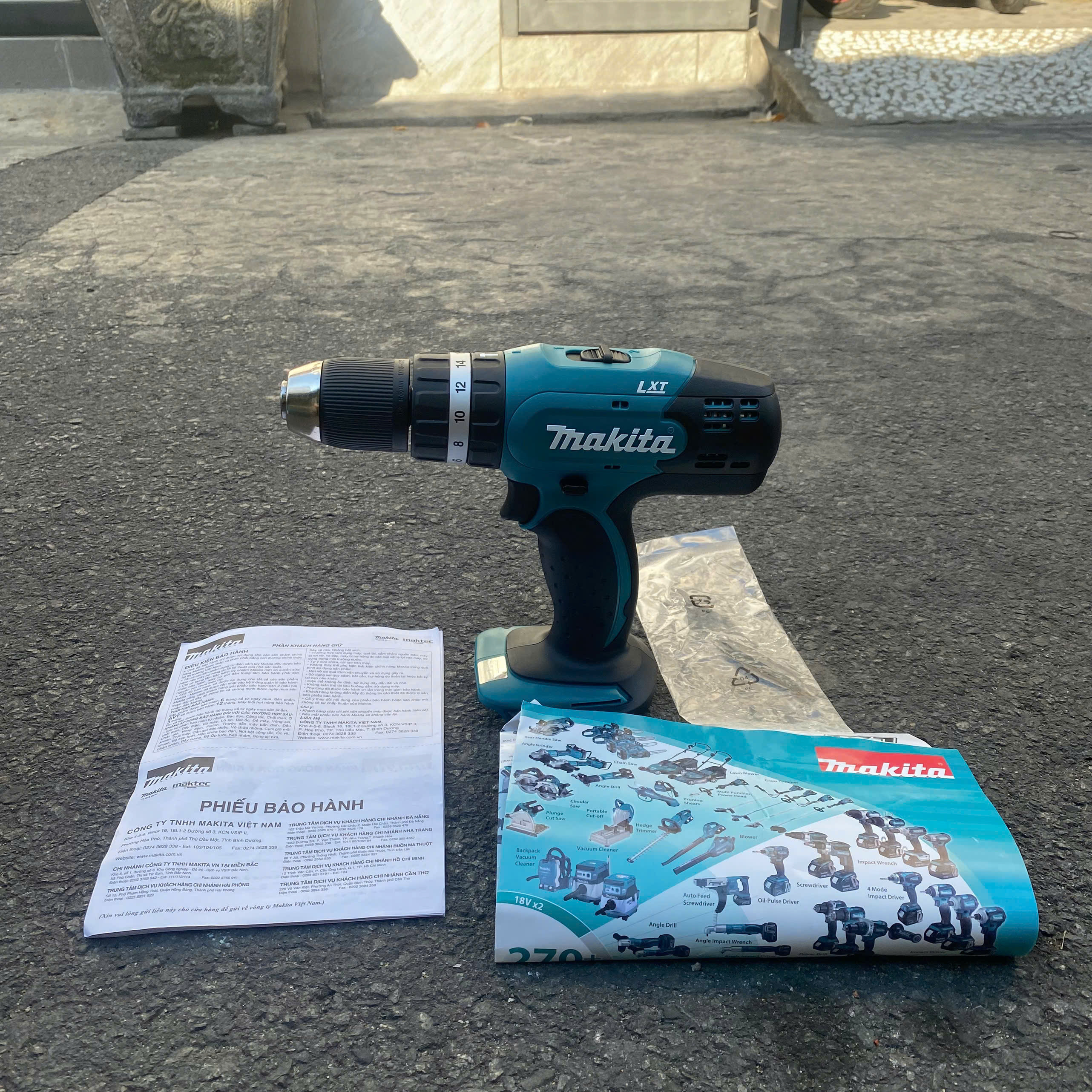 Máy khoan búa và vặn vít dùng pin Makita DHP453SFX8 ( 18V/3AH)
