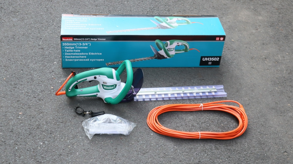 Máy tỉa hàng rào dùng điện Makita UH3502 350mm 